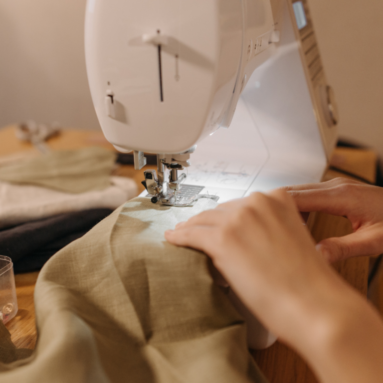 A photo of someone using a sewing machine