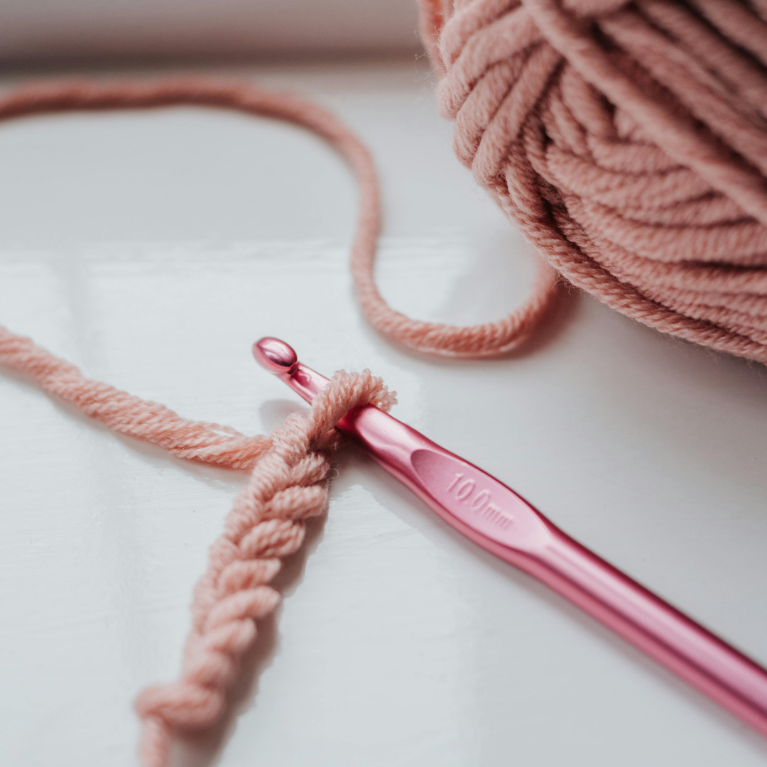 crochet needle and yarn