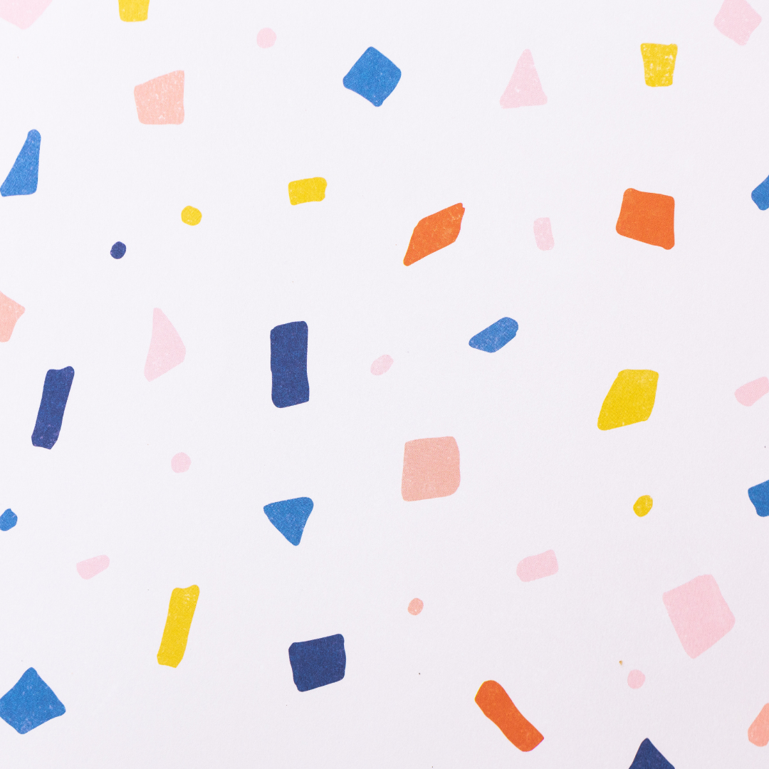 paint specks on a white wall